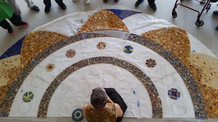 A mosaic mandala in progress in our Piece by Piece LA studio.